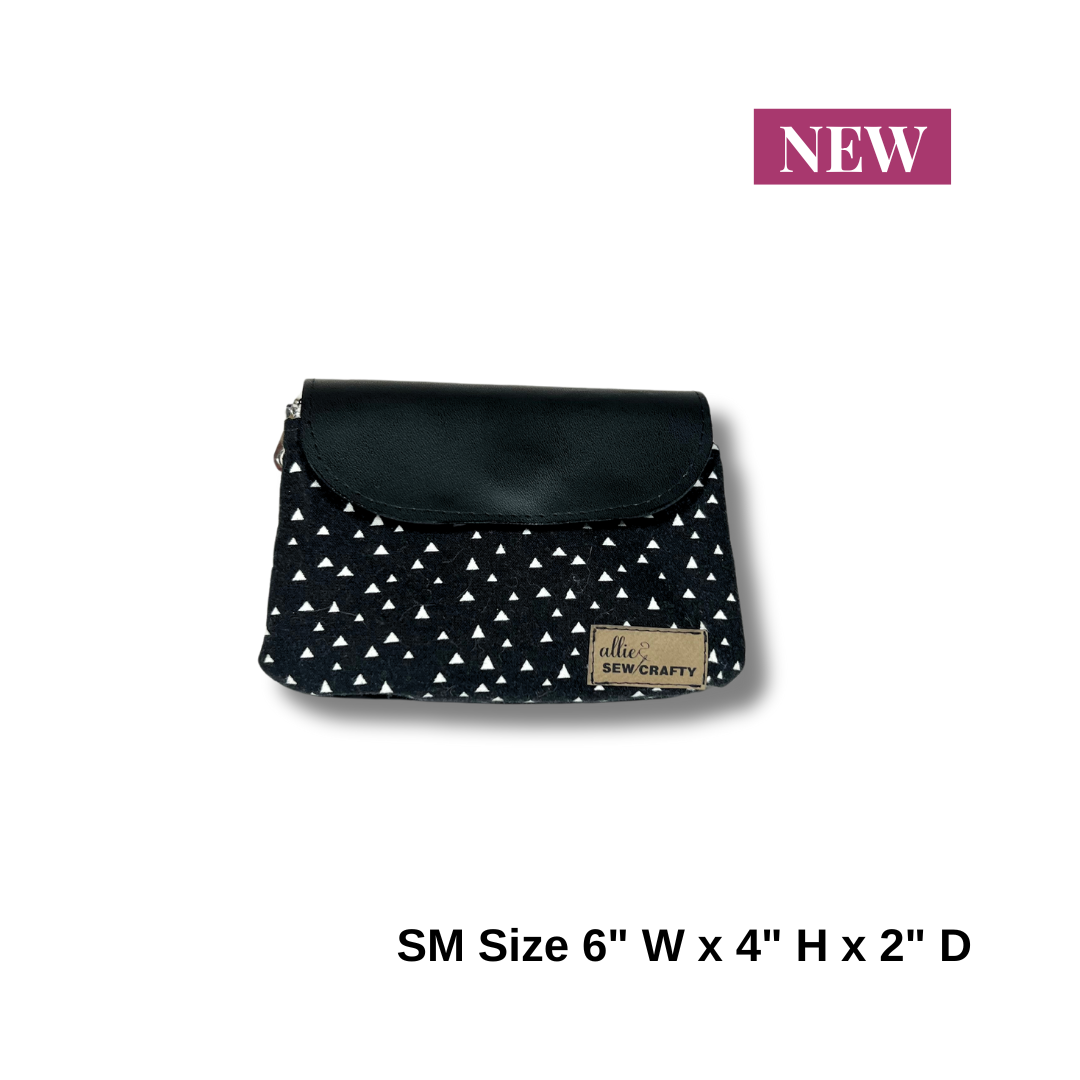 Mini Black and White Dual Zipper Pouch with Clear Lining.