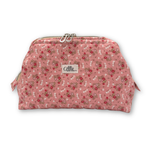 A pink floral makeup pouch with a silver zipper and a small 'Allie Sew Crafty' brand label on the front, set against a plain white background.